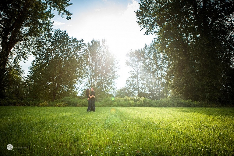 wide angle of couple in grass