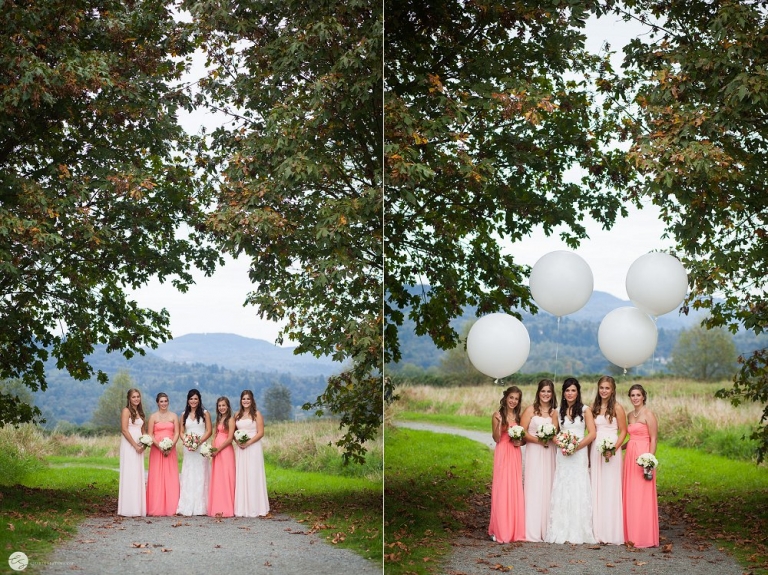 bride and bridesmaids holding big white balloons