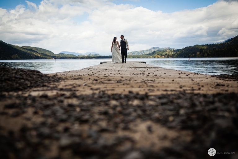 wide angle shot of couple on wedding day at cultus lake