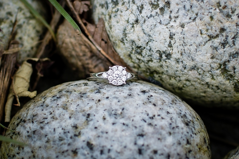 wedding ring between rocks