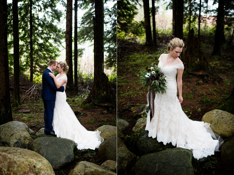 bride and groom standing on rocks at whonnock lake
